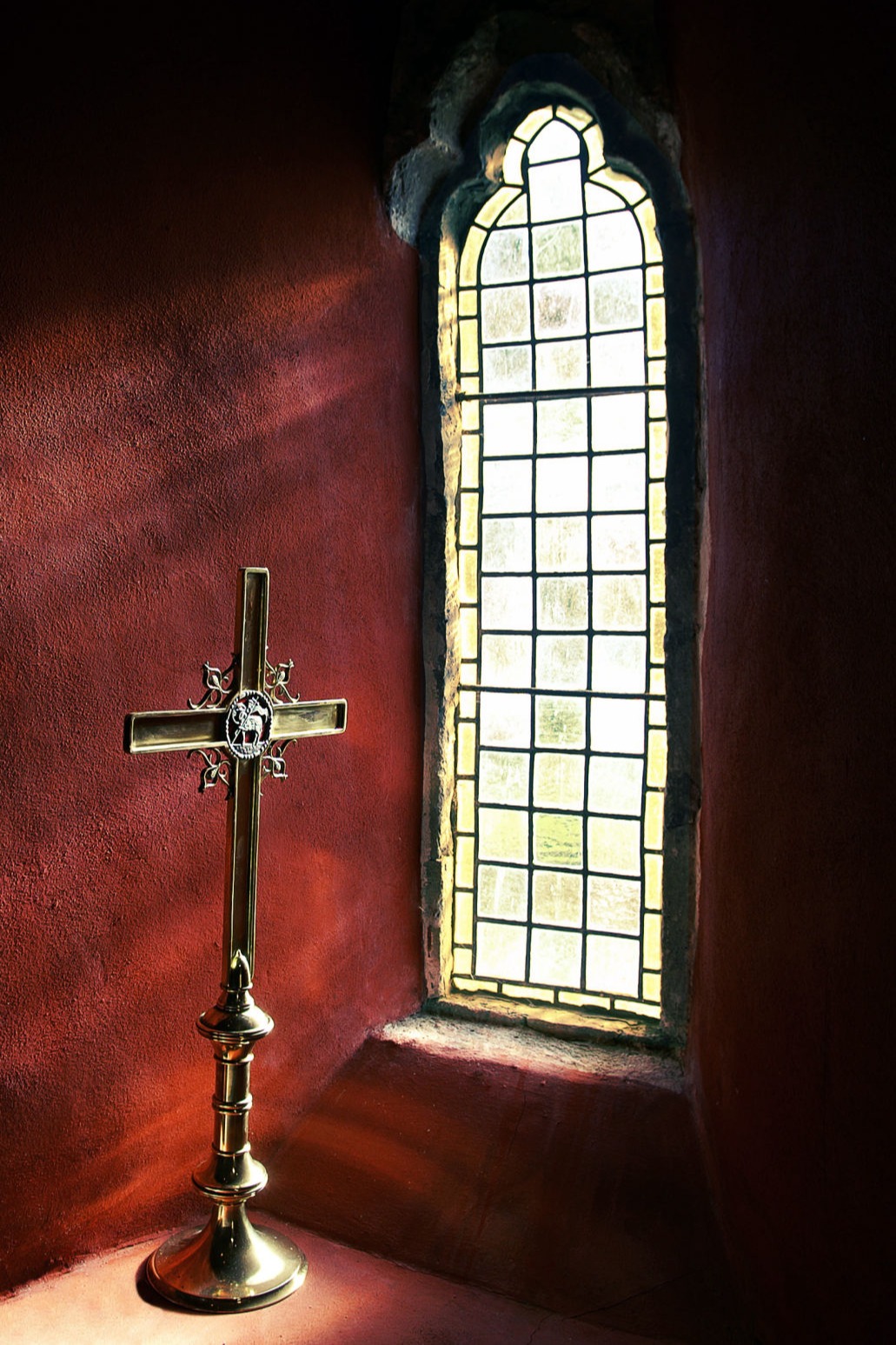 Cross by window