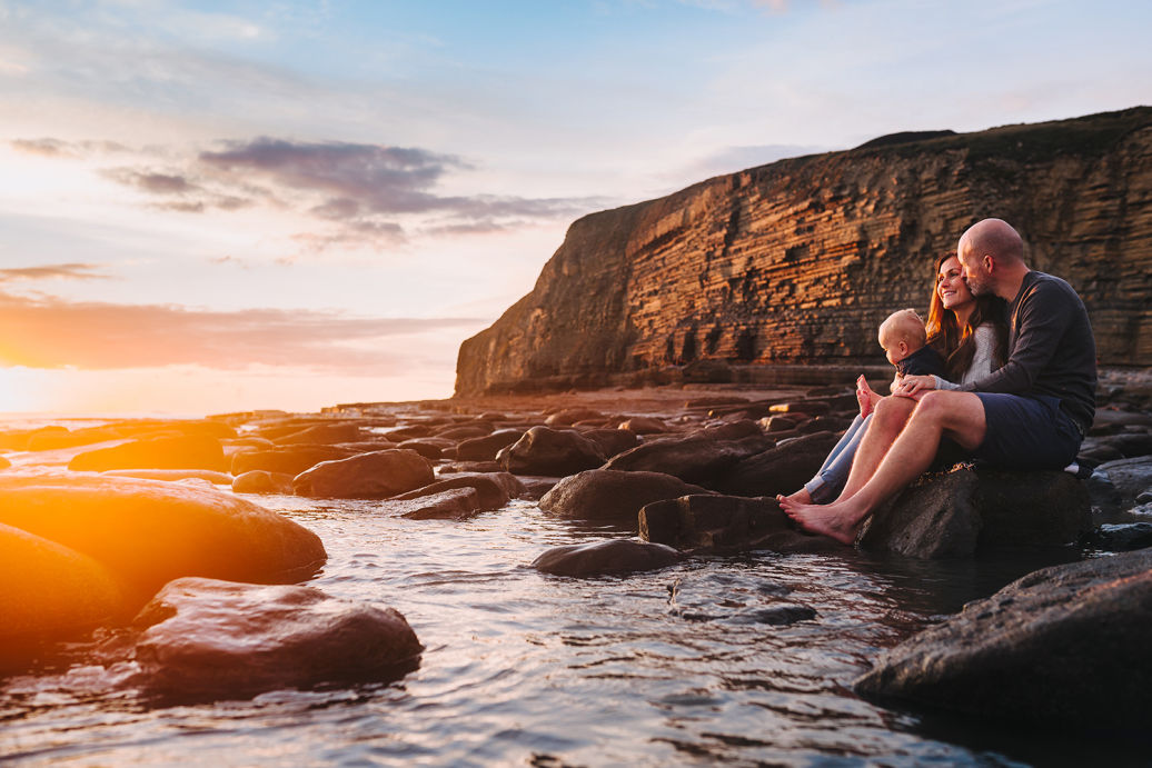 Couple on beach at sunset